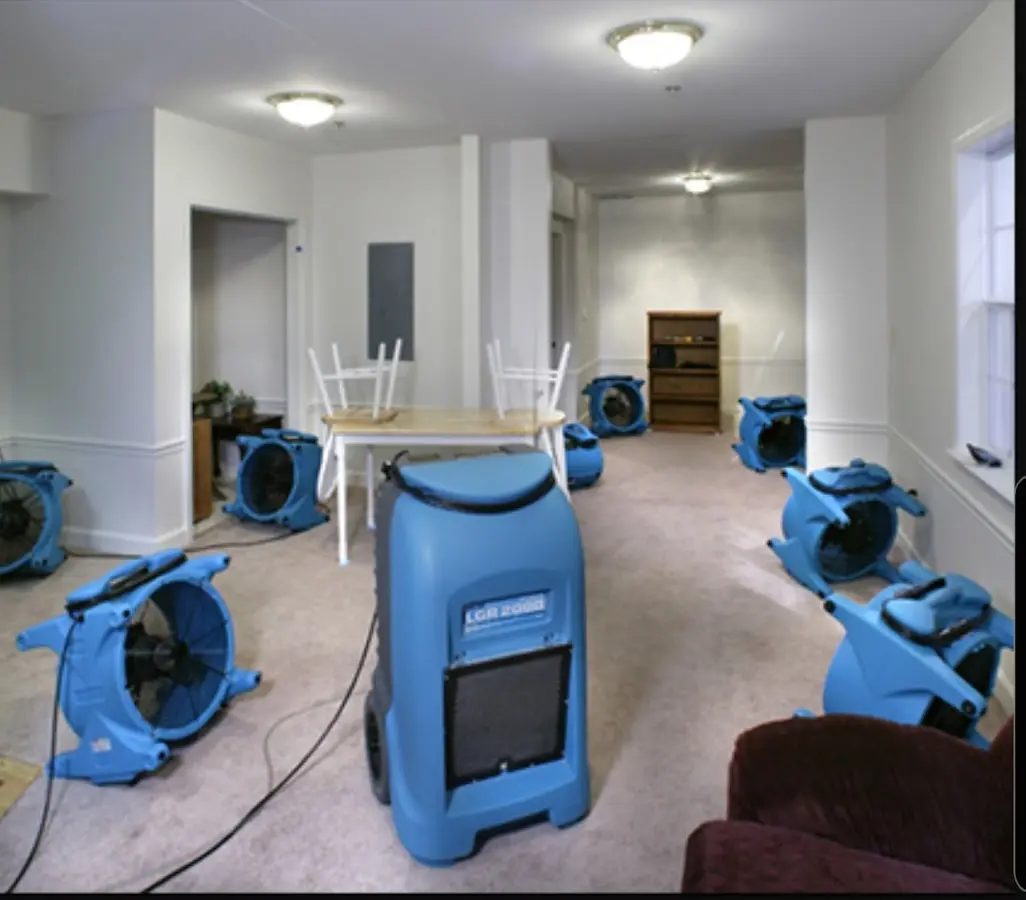 Air movers and dehumidifier setup for Water Damage Restoration in Robeson